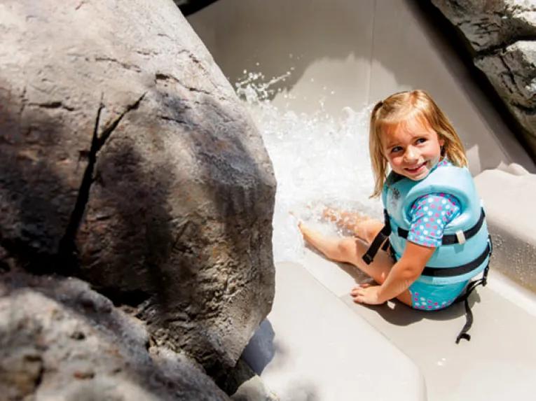 Girl playing on Bay Slides at Disney's Typhoon Lagoon