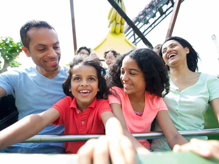Family enjoying Mr Monkey's Banana Ride at THORPE PARK