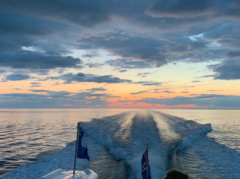 back-of-boat-sunset