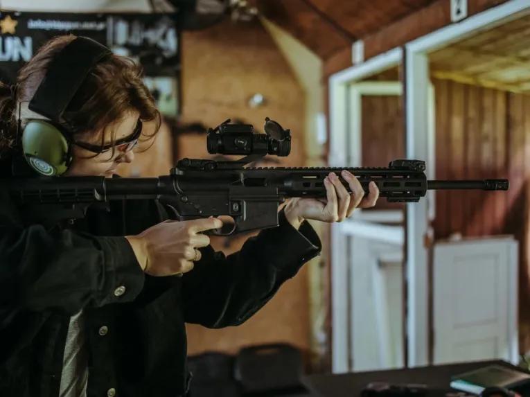 person-using-a-gun