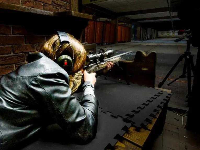person-lying-down-with-gun