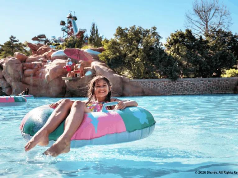 A girl in an inflatable ring at Melt-Away Bay, Disney's Blizzard Beach Water Park